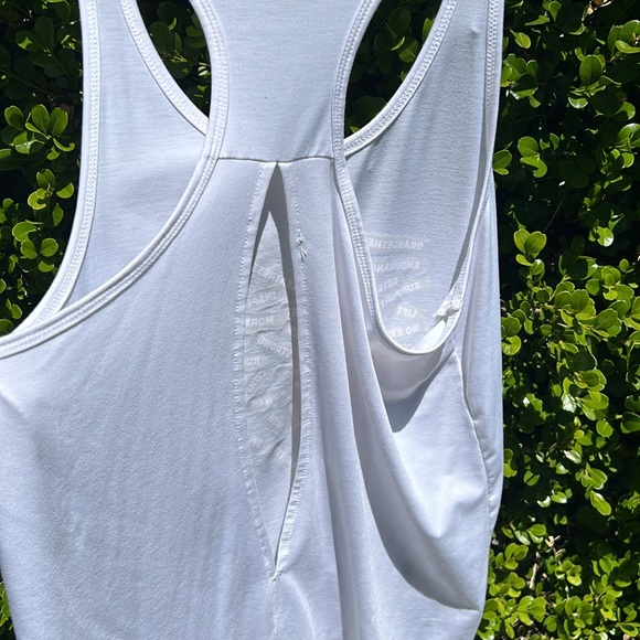 Orangetheory white tank with gold lettering and open slit in back - Picture 5 of 9